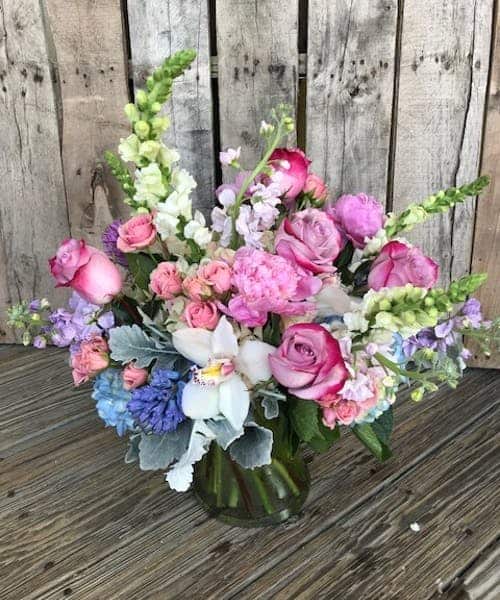 Send an abundance of love her way with this stunning work of art comprised of premium floral varieties, including Hydrangea, Roses, Spray Roses, Orchids, Lavender and more! * Flowers & colors may vary slightly.