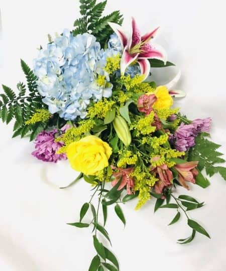 A beautiful wrapped assortment of color and flowers perfect for that do-it-yourself person.